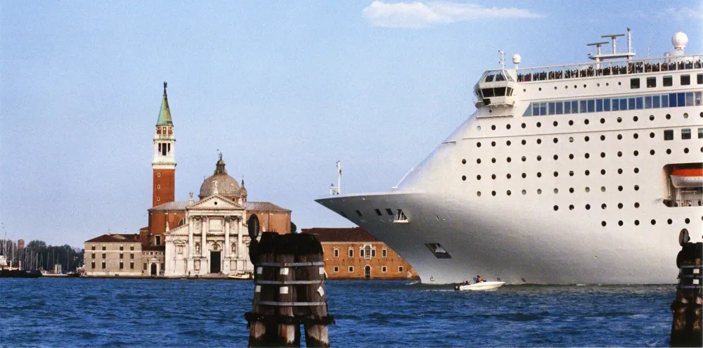 cruise ship in Venice dwarfing cathedral